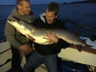 Matt Constantino, son of guide Captain Chuck Constantino and tournament winner John Powers on board Finlander holding th